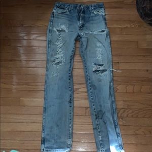 Ripped legs wranglers